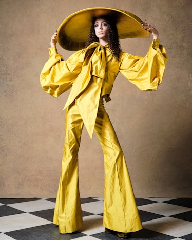 Model in yellow outfit at Harris Reed fall 2022