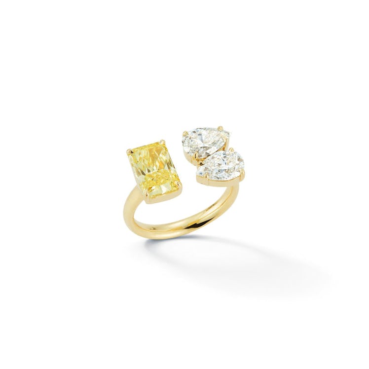 three stone open ring with yellow canary radiant diamond