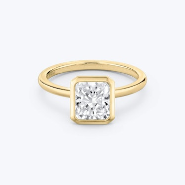 bezel set solitaire radiant engagement ring in yellow gold