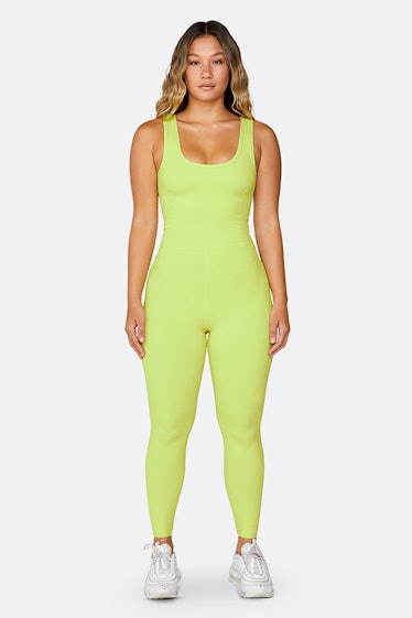 a neon yellow workout jumpsuit