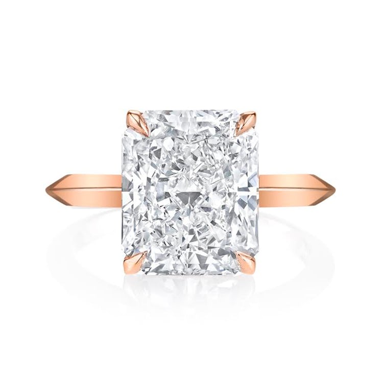 solitaire radiant cut diamond engagement ring set on a rose gold knife edge band