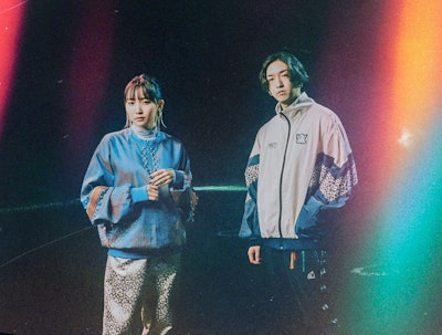 1. J-Pop Duo YOASOBI in their music video 