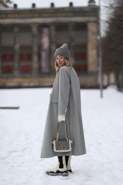 15 Snow Boot Outfits That Prove The Ugly Shoe Has Stylish Potential
