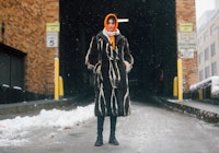 Irina Shnitman wears a snow boot outfit.