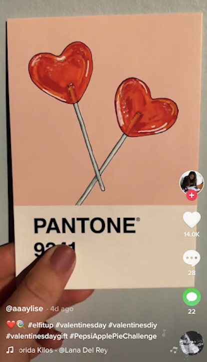 A TikTok user draws hearts on a Pantone color swatch for a DIY Valentine's Day gift.