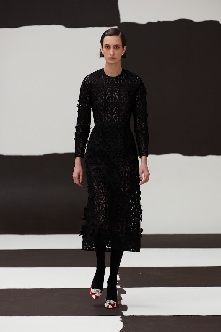 A model in a black knit Emilia Wickstead dress at the London Fashion Week Fall 2022