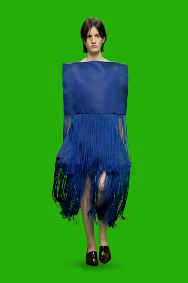 Model in blue fringe dress