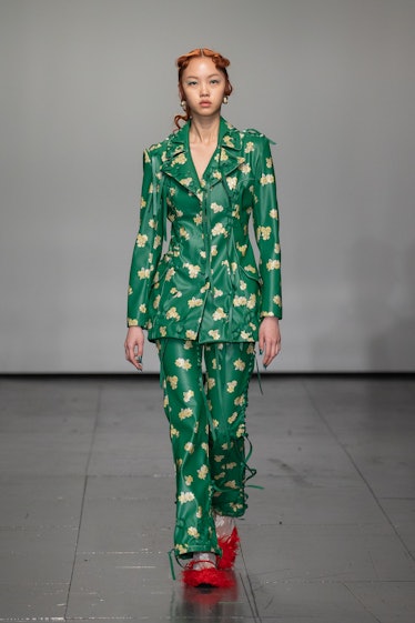 Model in green suit at Yuhan Wang fall 2022