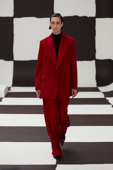 Model in Emilia Wickstead red suit