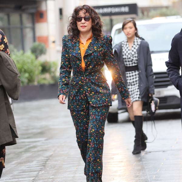 Sandra Oh wearing a floral pantsuit. 