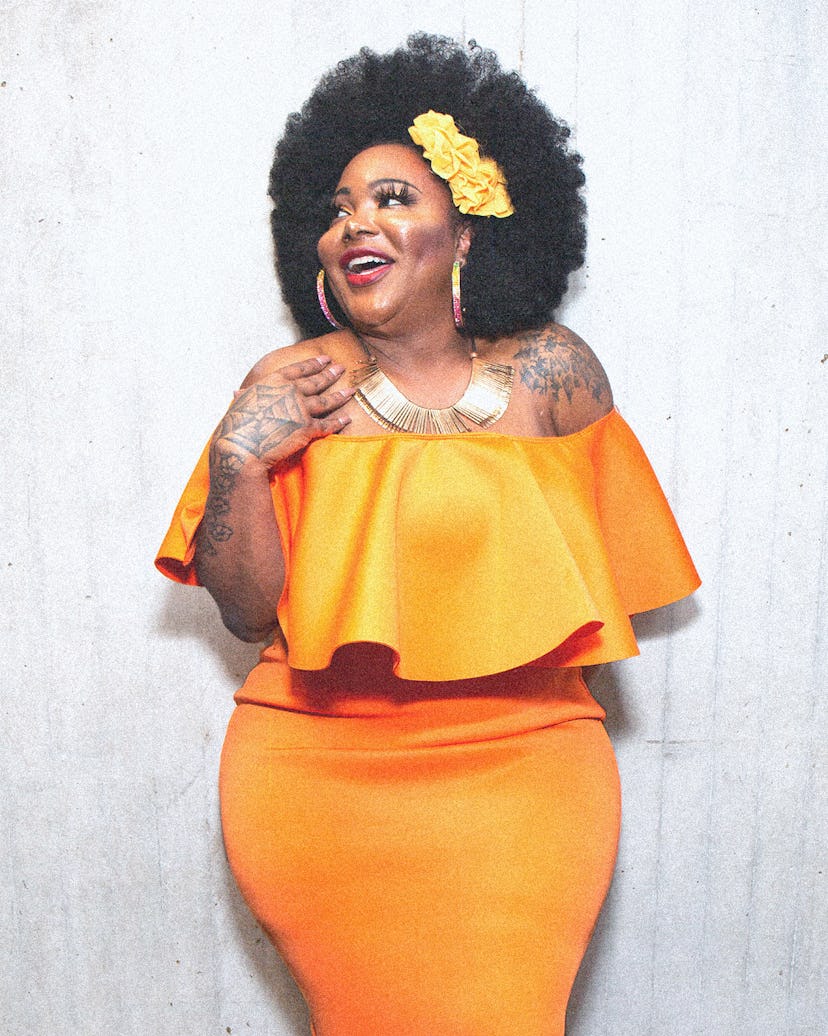 Ts Madison wearing an orange dress