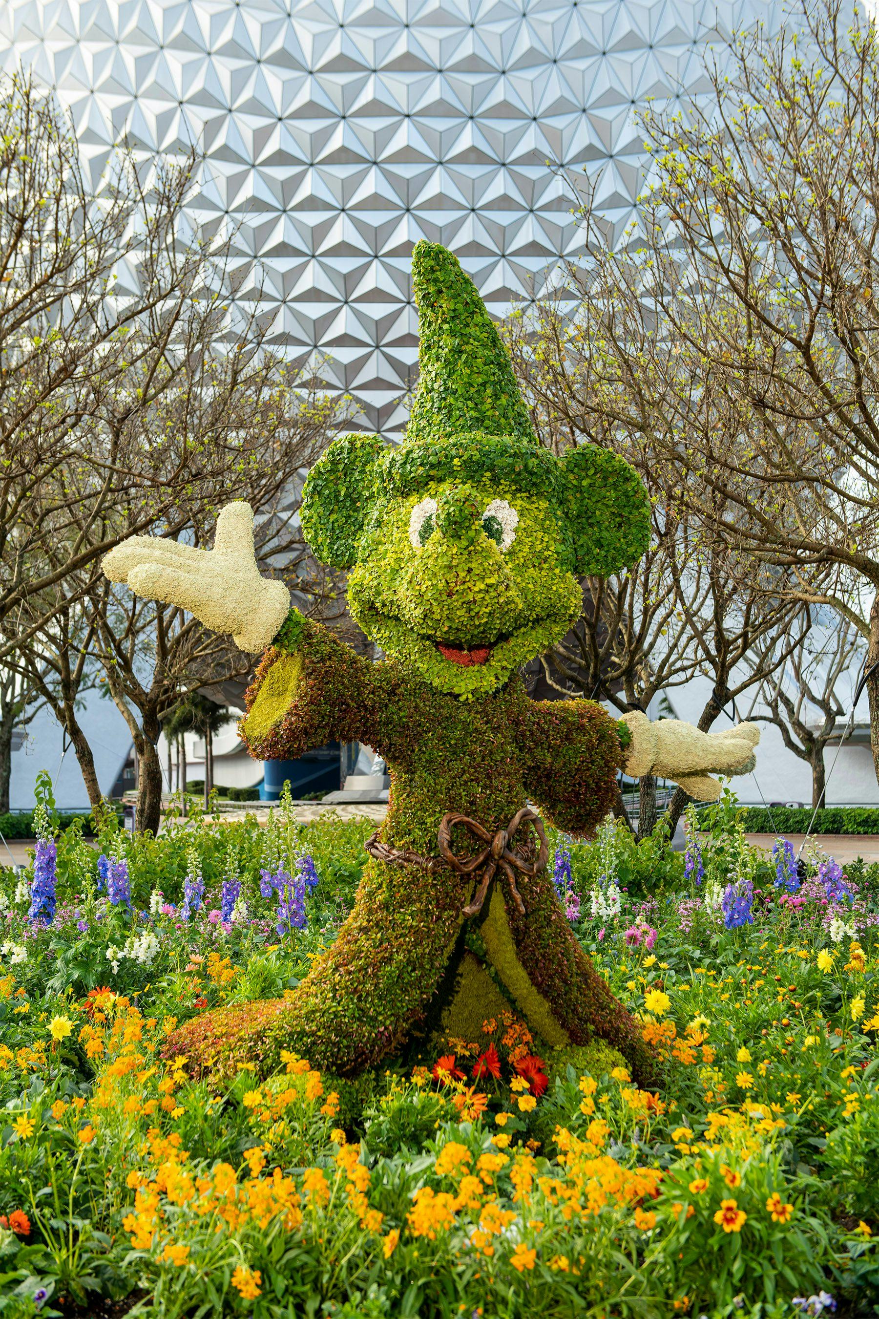 Disney's EPCOT International Flower and Garden Festival include character topiaries like this Mickey...
