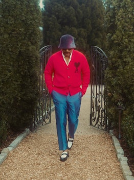 Steve Harvey in a sweater and bucket hat for PAPER Mag.