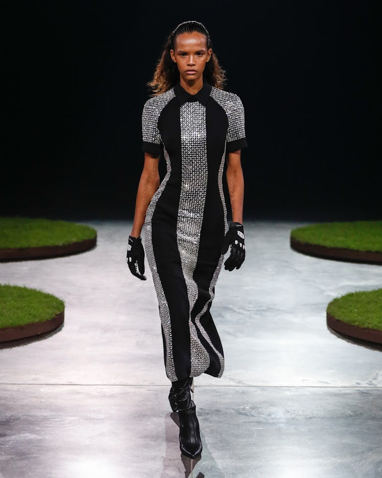 A model in a black-silver sequin dress by David Koma at the London Fashion Week Fall 2022