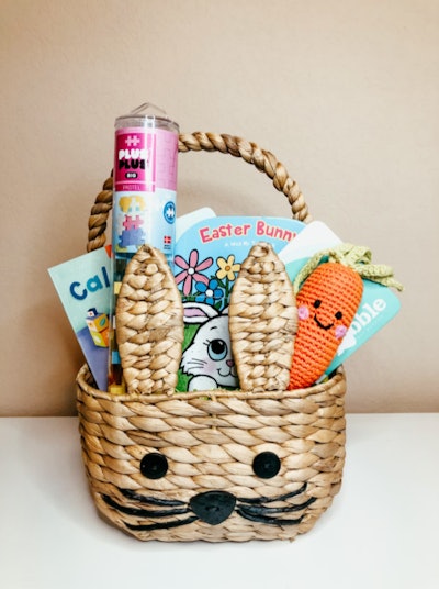 This premade Easter basket is filled with toys for babies.