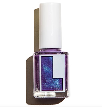 A glitter-infused grape color is an ideal choice for purple nails any time of year.