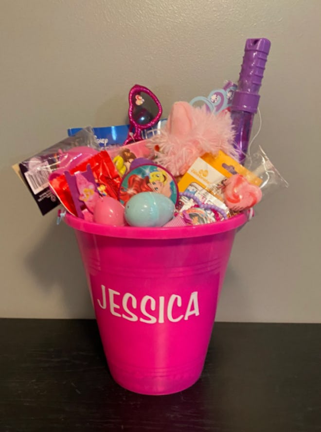 This premade Easter basket is a beach pail filled with toys for kids.