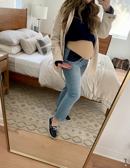 Laura six months pregnant wearing maternity underwear with maternity jeans