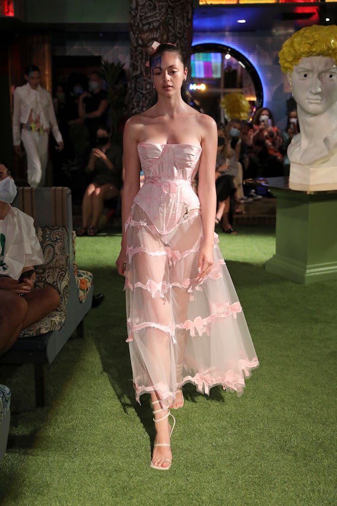 model wearing sexy clothes from saint sintra spring summer 2022