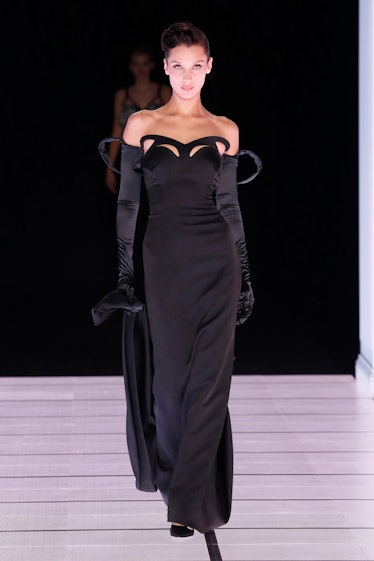 Bella Hadid walks the runway at the Moschino fashion show during the Milan Fashion Week Fall/Winter ...