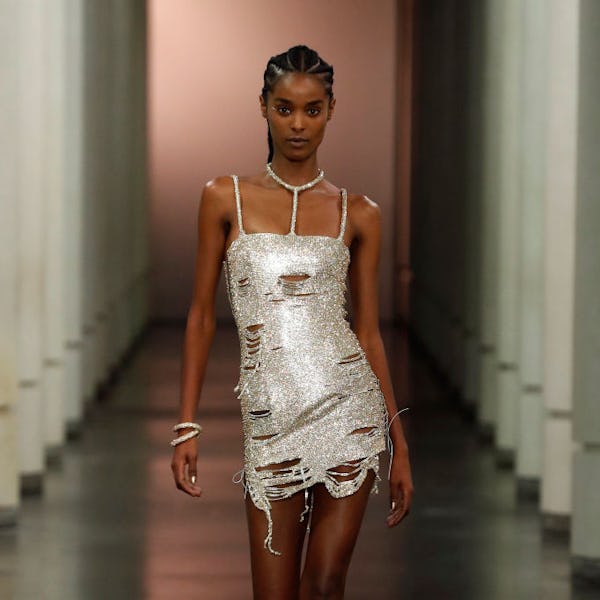 model wearing sexy clothing from ludovic de saint sernin spring summer 2022 show