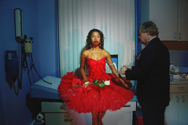 Kia LaBeija in a red dress