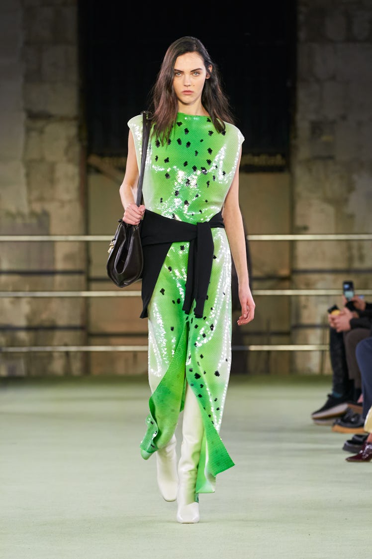 Model in green kiwi dress at Bottega Veneta fall 2022