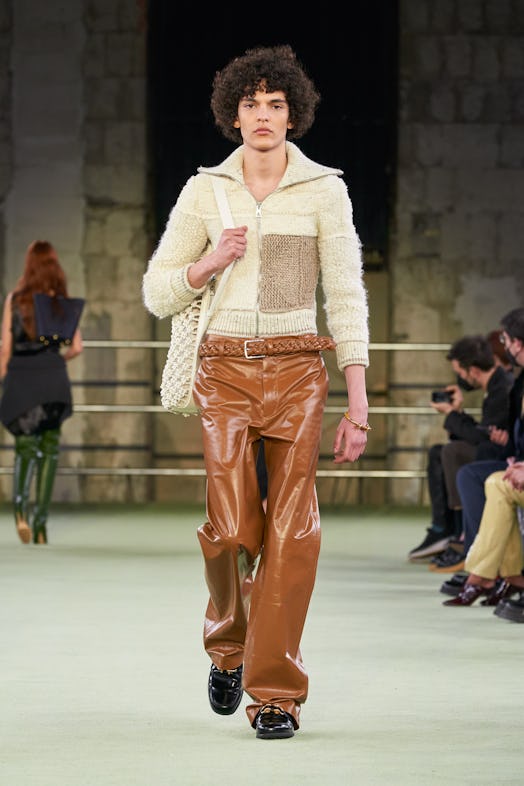 a model walks the Bottega Veneta show at Milan fashion week