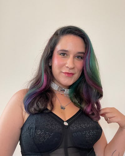 woman with teal, purple, and green dyed hair