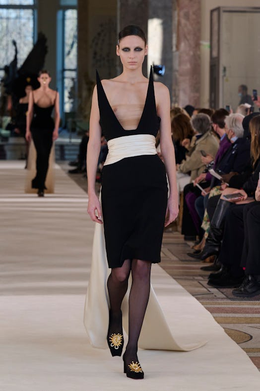 Eleonore Ghiuritan walks the runway during the Schiaparelli Haute Couture Spring/Summer 2022 show.
