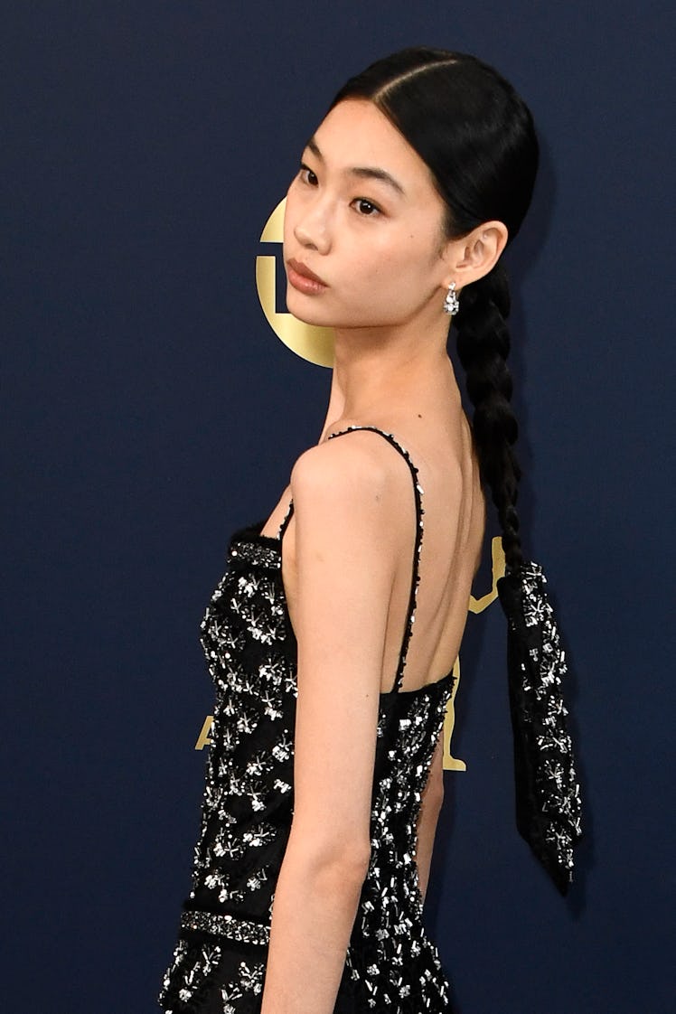 Squid Game's HoYeon Jung at the 2022 SAG Awards, with her hair braided in a meaningful way to her Ko...