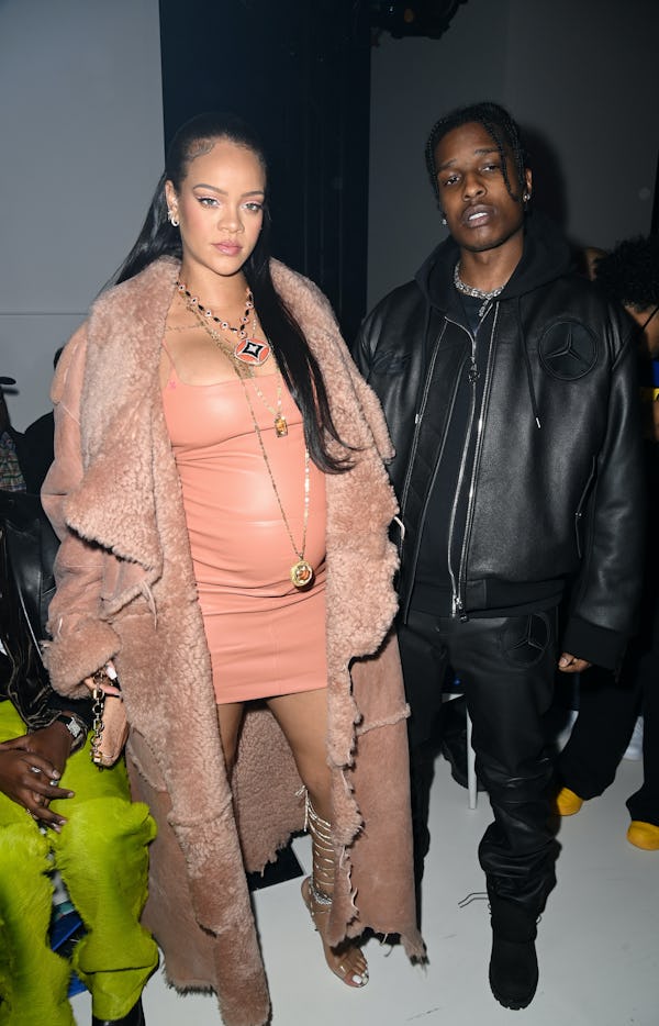 Rihanna and A$AP Rocky attend the Off-White Fall/Winter 2022 runway show.
