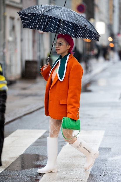 A guest attends  Copenhagen Fashion Week Fall/Winter 2022 Street Style