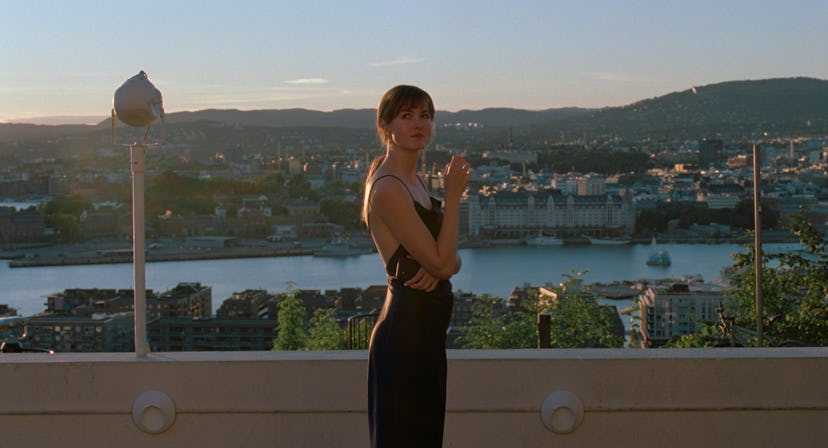 Renate Reinsve wearing a black dress in "The Worst Person in the World" film