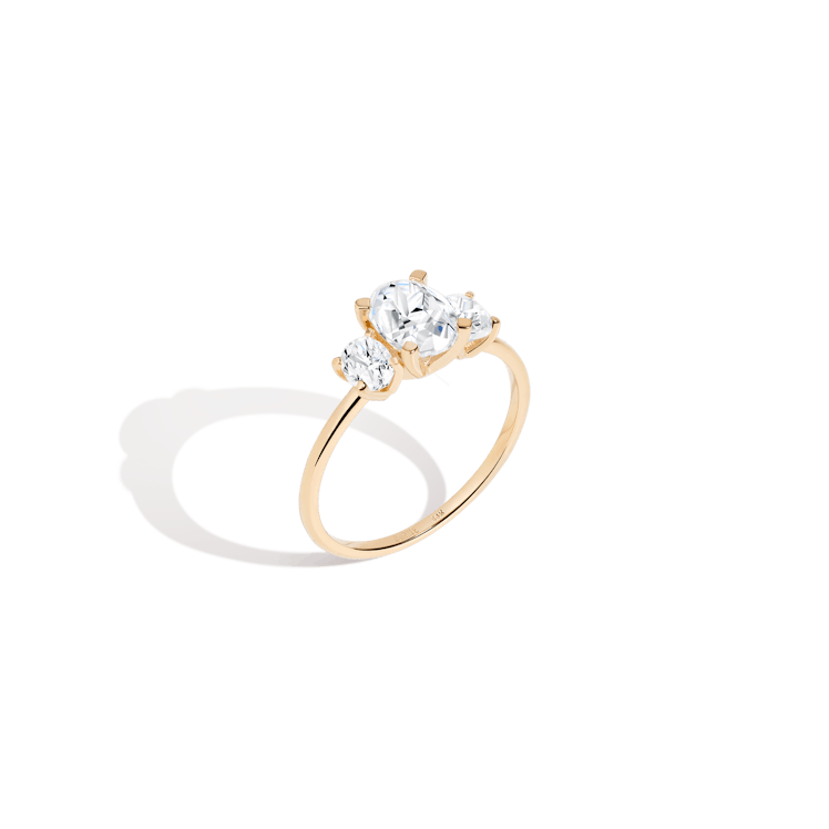 an three-stone oval lab-grown diamond engagement ring