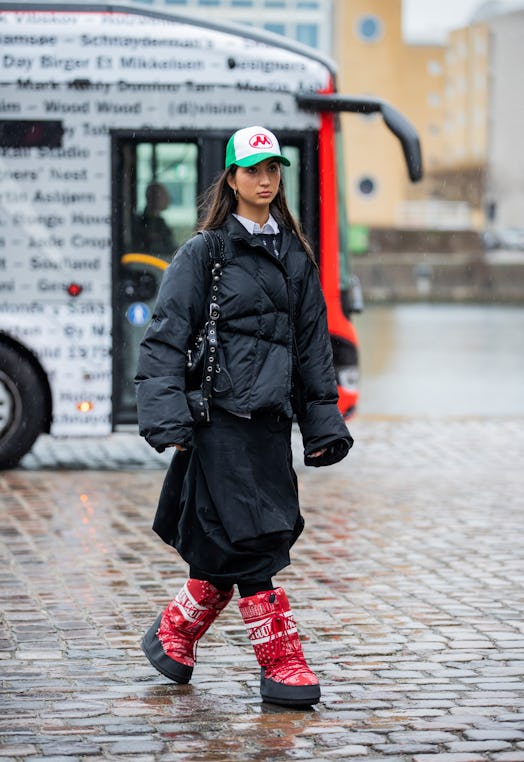 A guest attends Copenhagen Fashion Week Fall/Winter 2022 Street Style