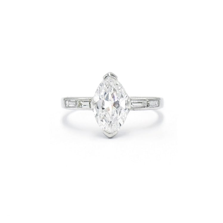 An antique cut marquise diamond engagement ring