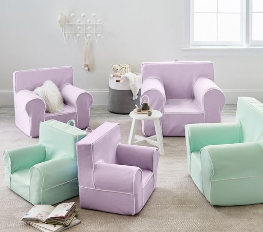 Several Pottery Barn Anywhere Chairs in purple and aqua
