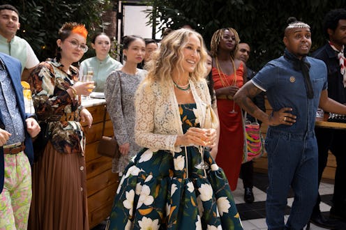 Sarah Jessica Parker as Carrie Bradshaw in an Oscar de la Renta gown with magnolias on it.