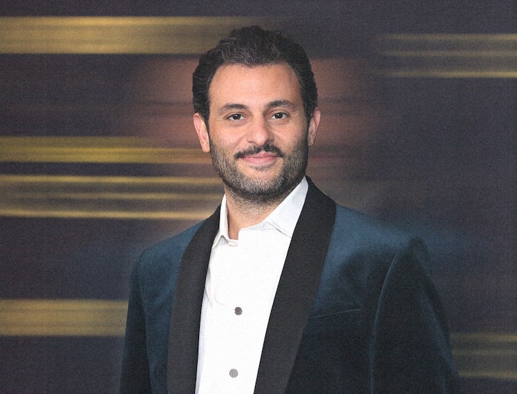 Arian Moayed wearing a blue suit