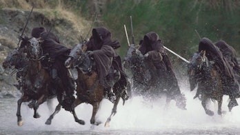 The Ringwraiths riding across the river in Lord of the Rings: The Fellowship of the Ring