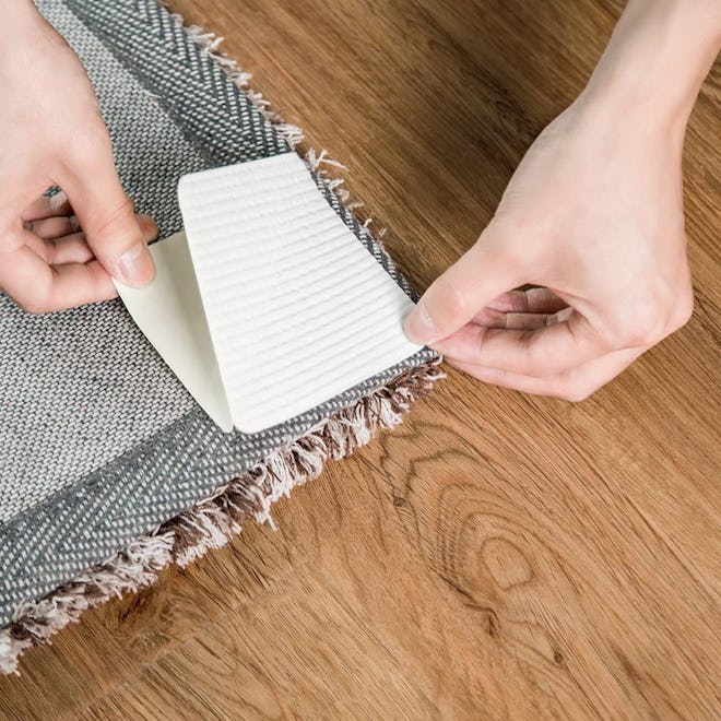 This pack of adhesive rug grippers is an inexpensive alternative to rug pads for hardwood floors.