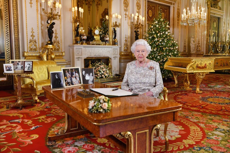 The Queen inside Buckingham Palace