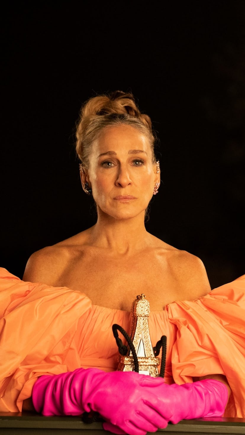 Sarah Jessica Parker as Carrie Bradshaw in a coral Valentino gown.