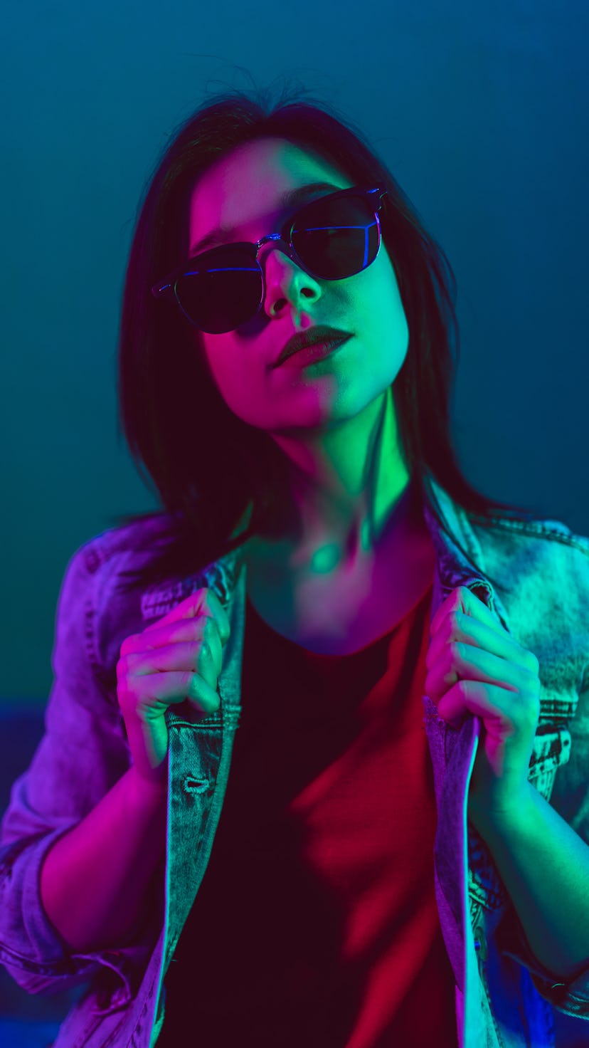 Young woman basking in February 2022's full snow moon, per her zodiac sign's horoscope.