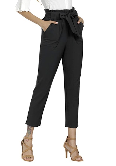 Woman modeling high waist, cropped black paper bag pants
