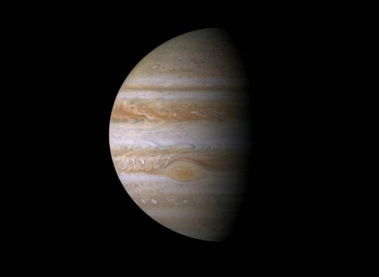 portrait of jupiter which is partially in shadows