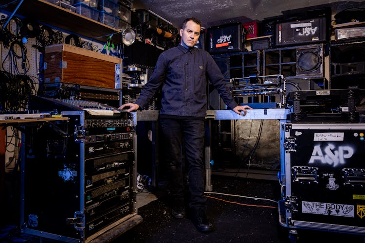 Tristan Shone aka Author & Punisher in his home workshop in San Diego