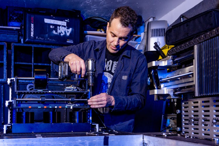 Tristan Shone aka Author & Punisher in his garage in San Diego
