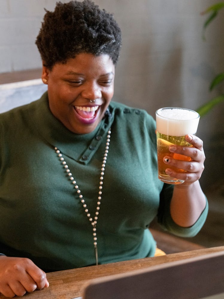 A woman hosts a women in beer event as part of the Galentine's Day 2022 virtual experiences on Airbn...